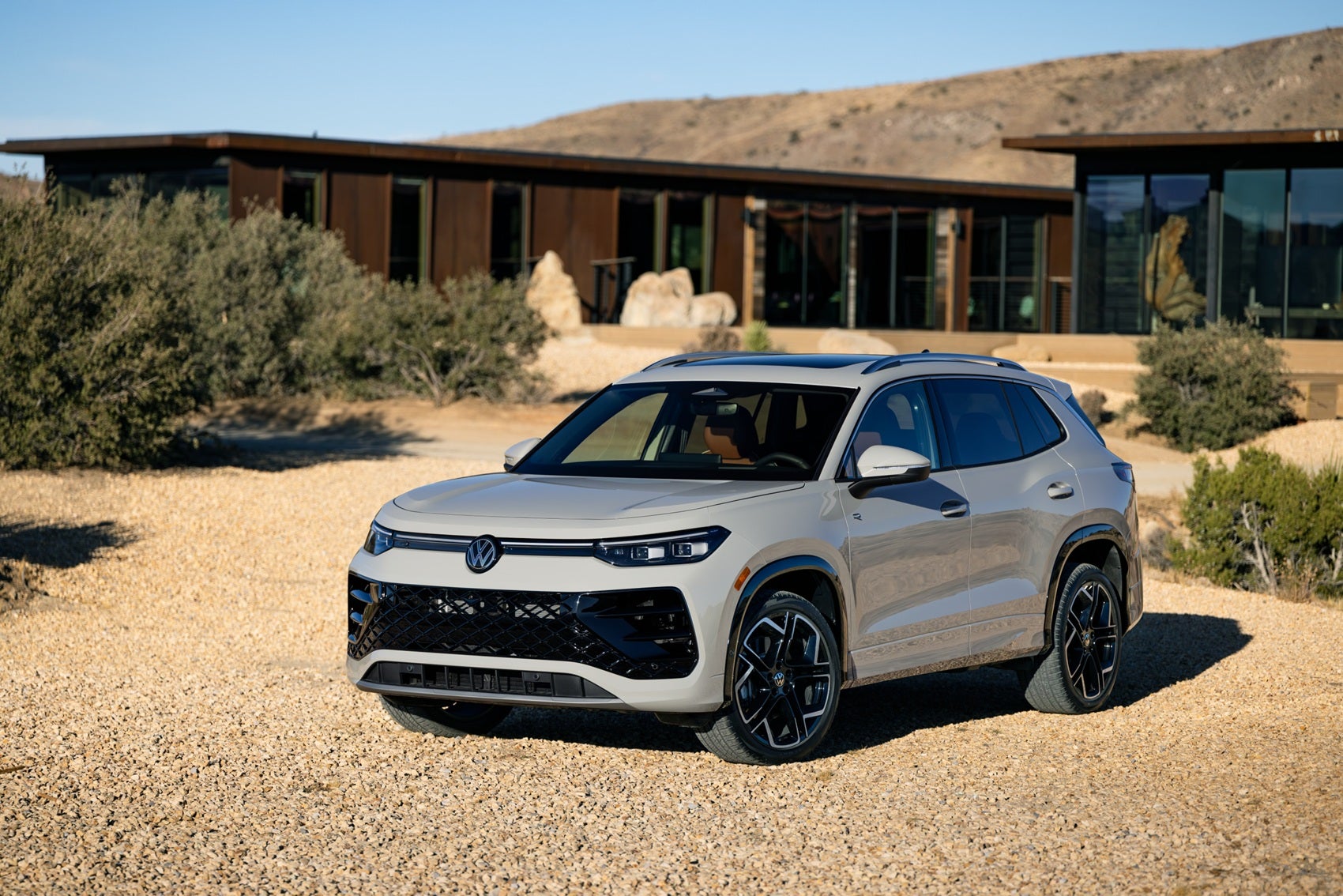 Volkswagen Tiguan R front exterior view with desert house background